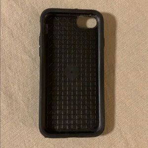 iPhone 8 Otterbox black case with ring holder.
